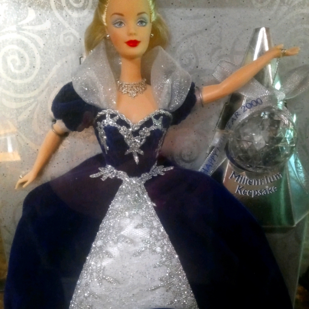 Rare millennium barbie with ornament.